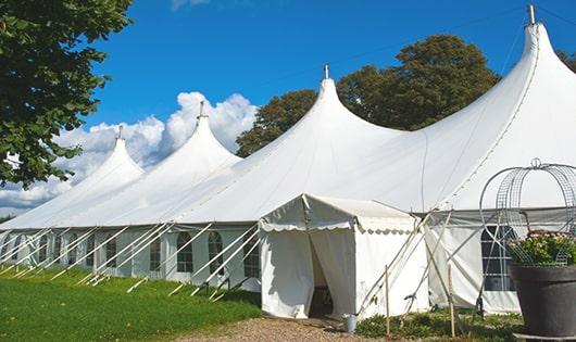 high-quality portable toilets stationed at a wedding, meeting the needs of guests throughout the outdoor reception in Central Falls RI